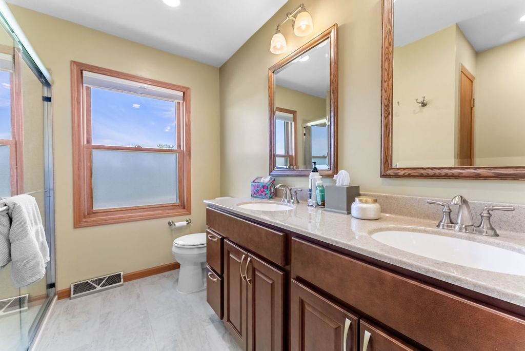 Image 19 of property listing at 11435 95th Avenue, Blue Grass, IA 52726