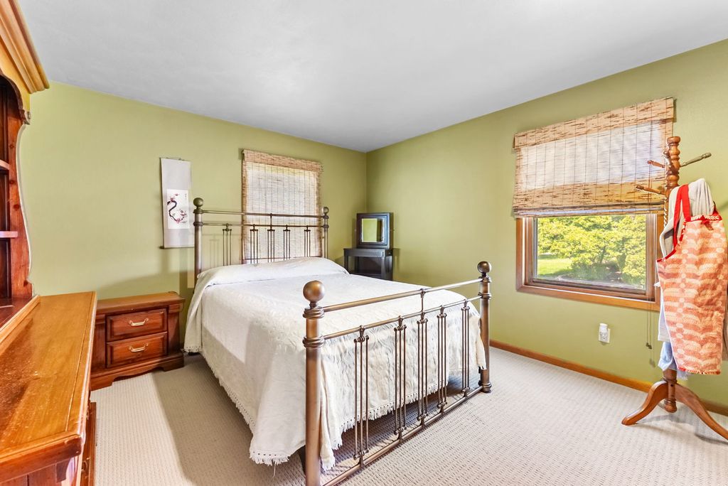 Image 21 of property listing at 11435 95th Avenue, Blue Grass, IA 52726
