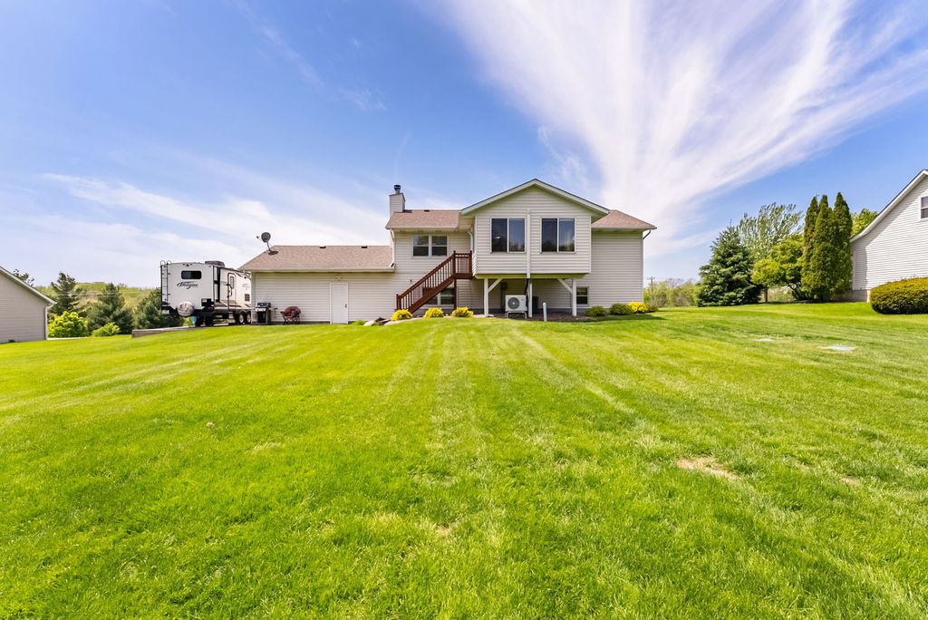 Image 6 of property listing at 11435 95th Avenue, Blue Grass, IA 52726