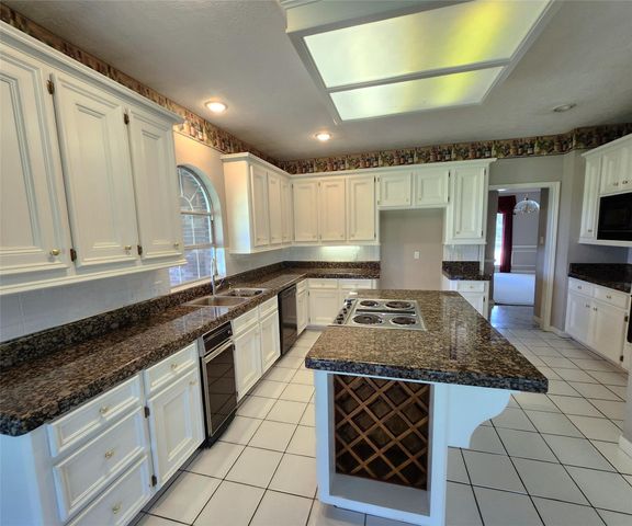 104 April Wind Drive S, Conroe, TX 77356