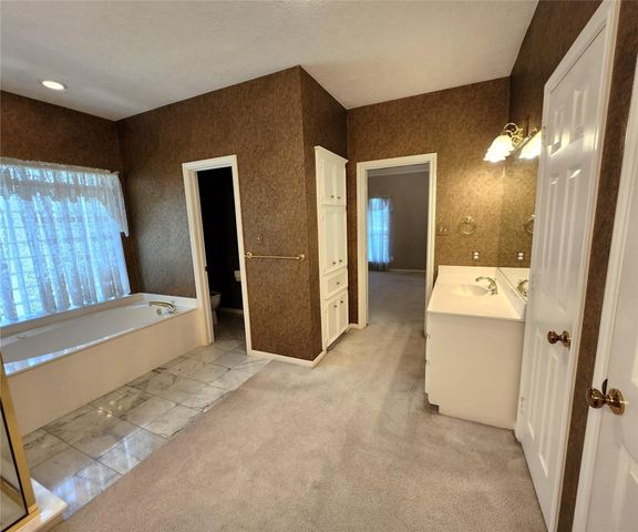 104 April Wind Drive S, Conroe, TX 77356