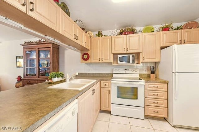 2596 Kings Lake BLVD 5-103, Naples, FL 34112