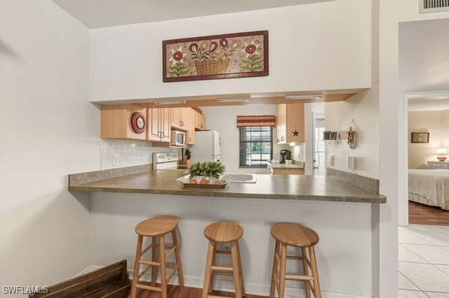 2596 Kings Lake BLVD 5-103, Naples, FL 34112