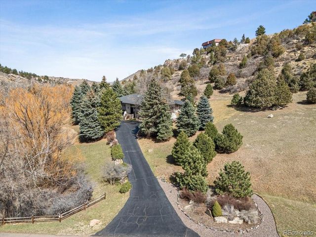 5852 Willowbrook Dr, Morrison, CO 80465