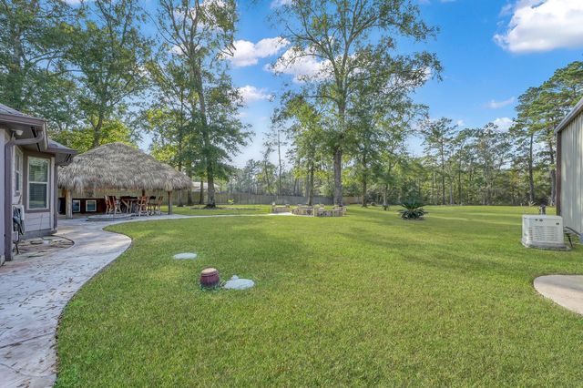 11486 Oak Springs Drive, Willis, TX 77378