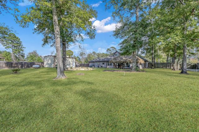 11486 Oak Springs Drive, Willis, TX 77378