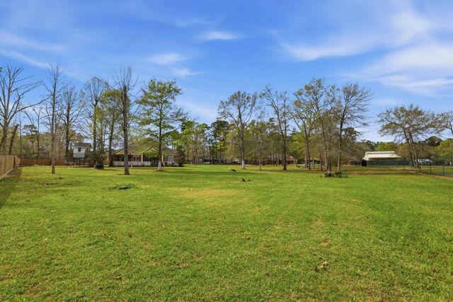 9942 Ramzi Drive, Conroe, TX 77303