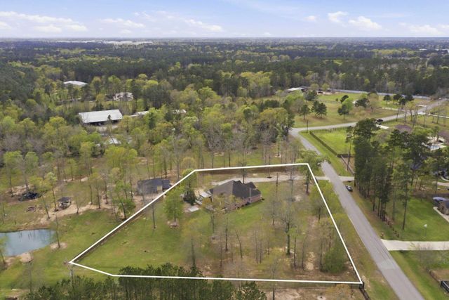 9942 Ramzi Drive, Conroe, TX 77303