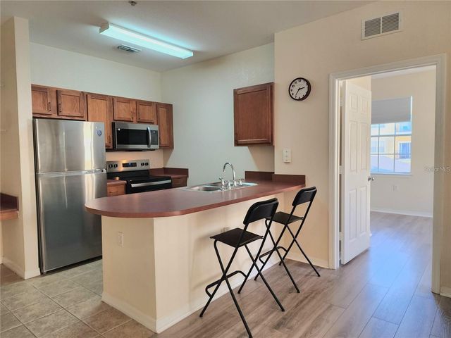 8137 CLAIRE ANN DRIVE 203, Orlando, FL 32825