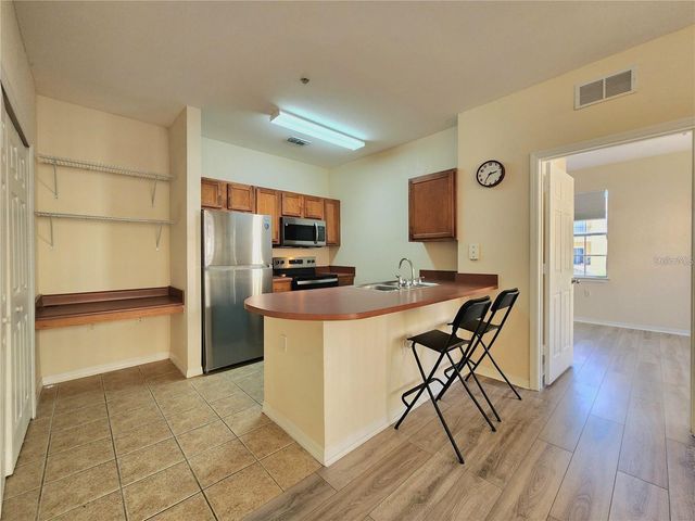 8137 CLAIRE ANN DRIVE 203, Orlando, FL 32825