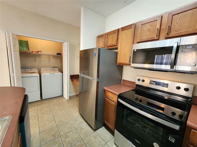 8137 CLAIRE ANN DRIVE 203, Orlando, FL 32825