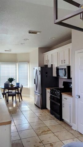 2402 Raintree Village Drive, Katy, TX 77449