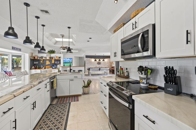 118 ELYSIUM Drive, Royal Palm Beach, FL 33411