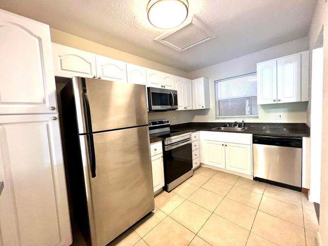 120 Sparrow Drive Apt 302, Royal Palm Beach, FL 33411