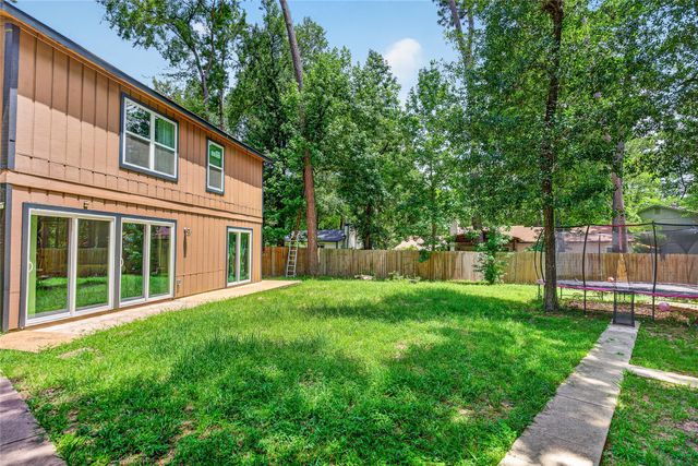 1610 N Red Cedar Circle, The Woodlands, TX 77380