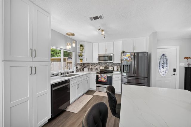 1610 N Red Cedar Circle, The Woodlands, TX 77380
