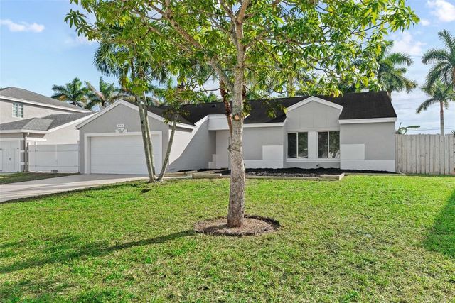 9918 Moss Pond Drive, Boca Raton, FL 33496