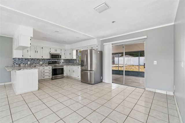 1719 JULIAN LANE DRIVE, Tampa, FL 33619