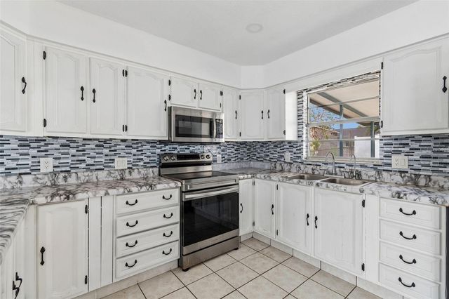 1719 JULIAN LANE DRIVE, Tampa, FL 33619