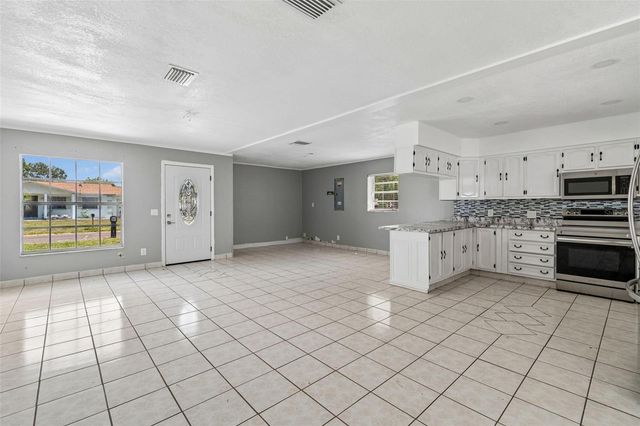 1719 JULIAN LANE DRIVE, Tampa, FL 33619