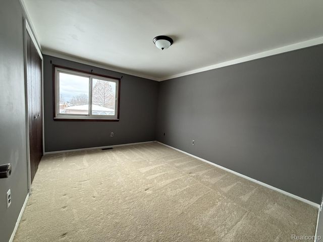 18523 Elm Court, Macomb Township, MI 48044