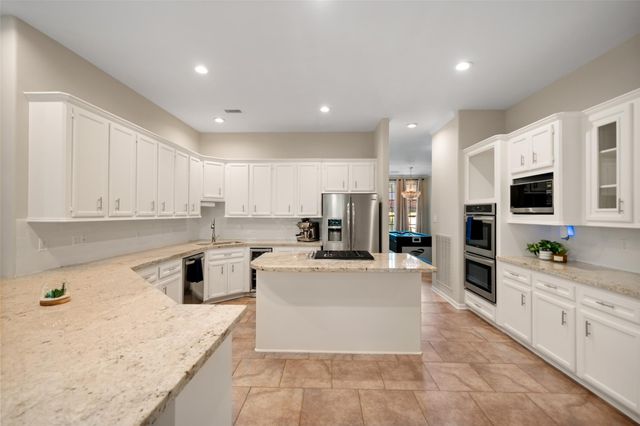 2400 Hollowbrook Lane, Conroe, TX 77384