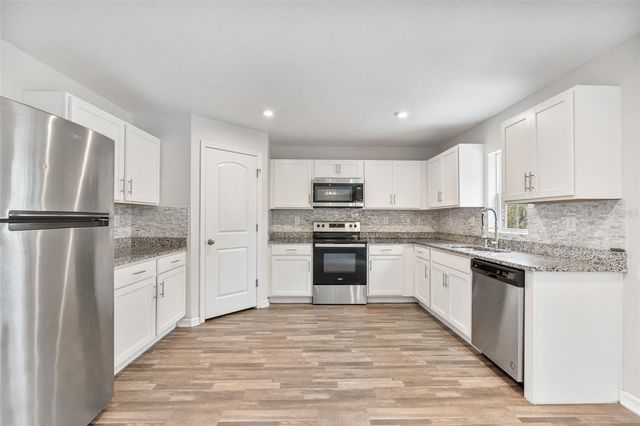 1463 SWAN COURT, Poinciana, FL 34759