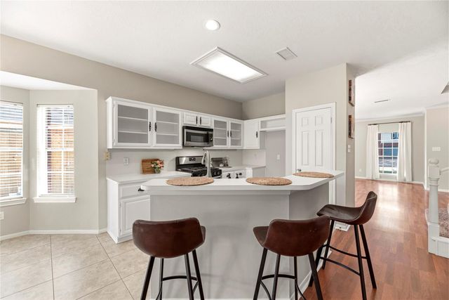 7718 Woodlett Court, Houston, TX 77095