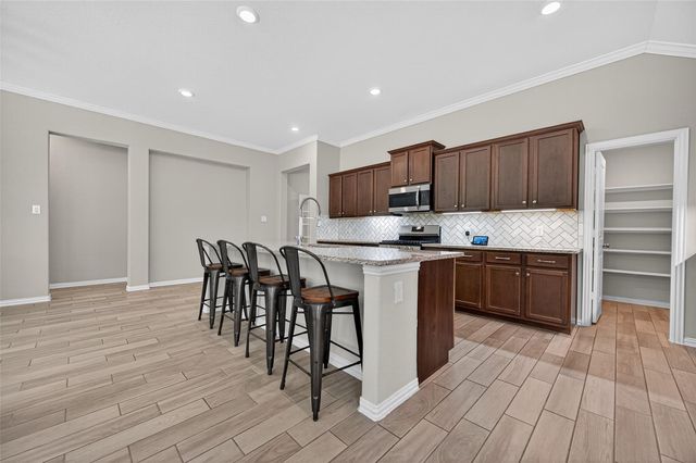 4550 Shallow Ember Drive, Spring, TX 77386