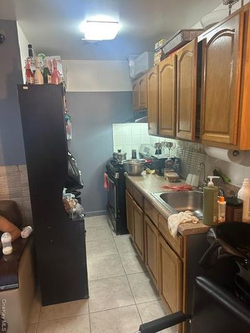 104-29 Roosevelt, Corona, NY 11368