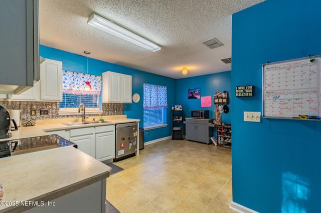 96020 TIDAL BAY Court, Yulee, FL 32097