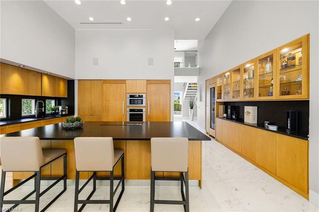 12933 Coco Plum LN, Naples, FL 34119