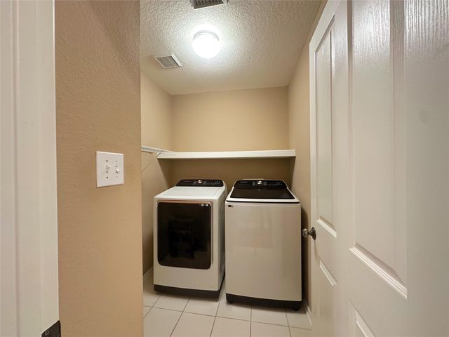 59 N Flickering Sun Circle, The Woodlands, TX 77382