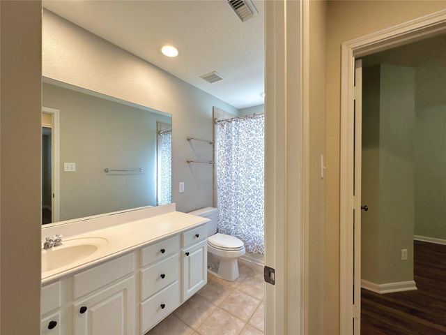 59 N Flickering Sun Circle, The Woodlands, TX 77382