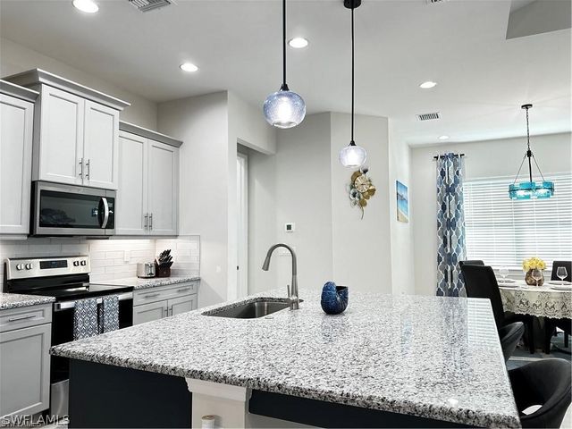 7135 Cayo Coco LN, Naples, FL 34113