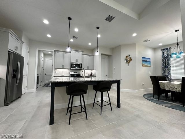 7135 Cayo Coco LN, Naples, FL 34113