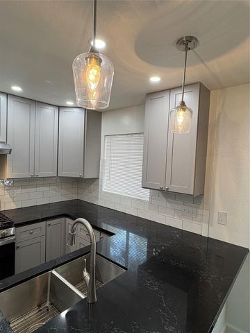 9006 Winding River Drive, Houston, TX 77088