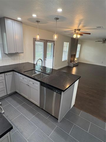 9006 Winding River Drive, Houston, TX 77088