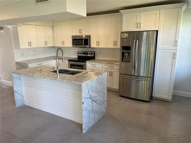 9015 W Sunrise Boulevard, Plantation, FL 33322