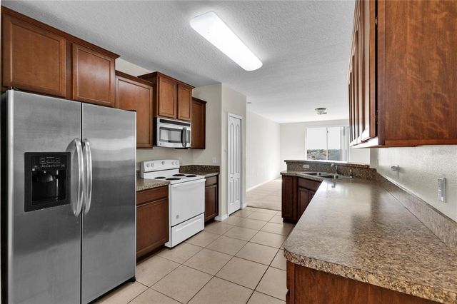 9002 ORANGE BLOSSOM LOOP, Haines City, FL 33844