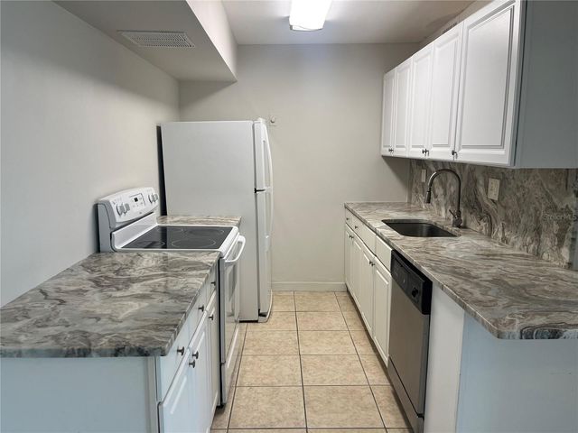 10355 PARADISE BOULEVARD 113, Treasure Island, FL 33706