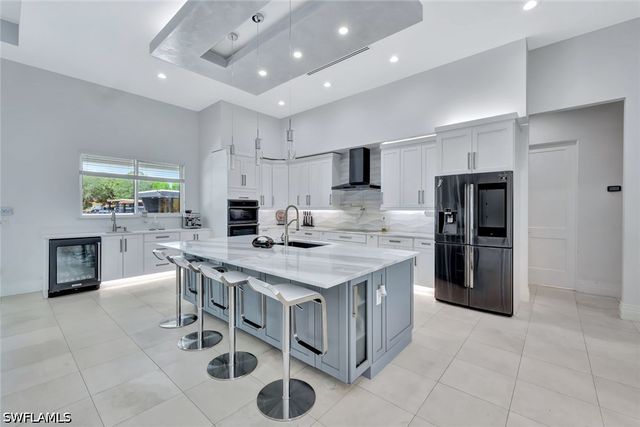 140 37th AVE NW, Naples, FL 34120