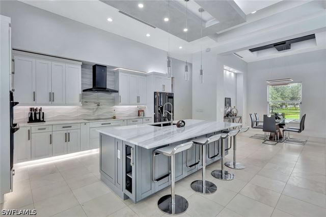140 37th AVE NW, Naples, FL 34120