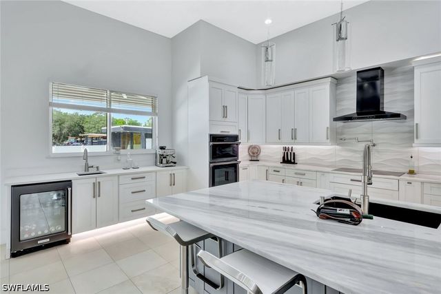140 37th AVE NW, Naples, FL 34120