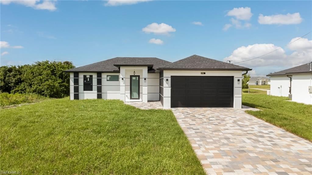 2702 11Th St SW, LEHIGH ACRES, FL 33976 — exterior