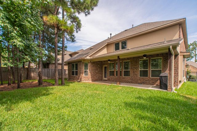 31 Whispering Thicket Place, The Woodlands, TX 77375