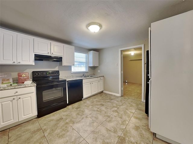 3821 BEECHWOOD BOULEVARD, Tampa, FL 33619