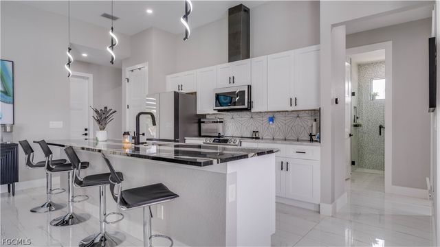 4211 10th ST SW, Lehigh Acres, FL 33976