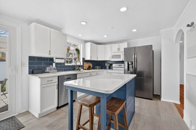 9609 S TJ DR, Sandy, UT 84070