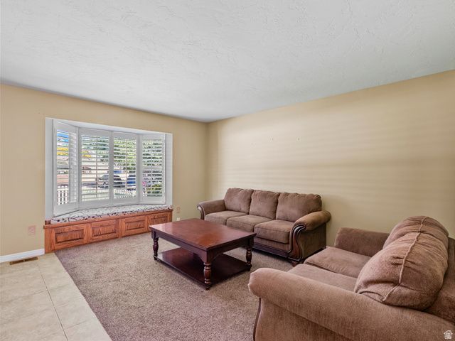 5547 S HARVEY HEIGHTS DR, Taylorsville, UT 84129